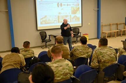 Participants receive classroom instruction on Explosive Ordinance Hazards at Joint Base San Antonio-Lackland, Texas on Feb. 8, 2024. Due to the variety of unexploded ordinances (UXO) and firing mechanisms, airmen must develop a strong discernment for proper identification and response procedures. (US Air Force photo by Alex Dieguez)