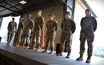 Col. Silas Darden recognizes Gladiator Resolve top performers (left-to-right) A1C Fatoumata Siby, SrA Davionte Shannon, AB Jace Shinn, SrA Aydan Arreola, SrA Calvin Kartono and SSgt Monica Washington at JBSA-Lackland, Texas on Feb 9, 2024. (US Air Force photo by Alex Dieguez)