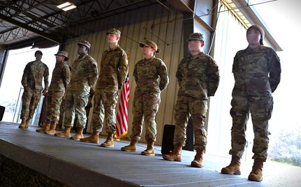 Col. Silas Darden recognizes Gladiator Resolve top performers (left-to-right) A1C Fatoumata Siby, SrA Davionte Shannon, AB Jace Shinn, SrA Aydan Arreola, SrA Calvin Kartono and SSgt Monica Washington at JBSA-Lackland, Texas on Feb 9, 2024. (US Air Force photo by Alex Dieguez)