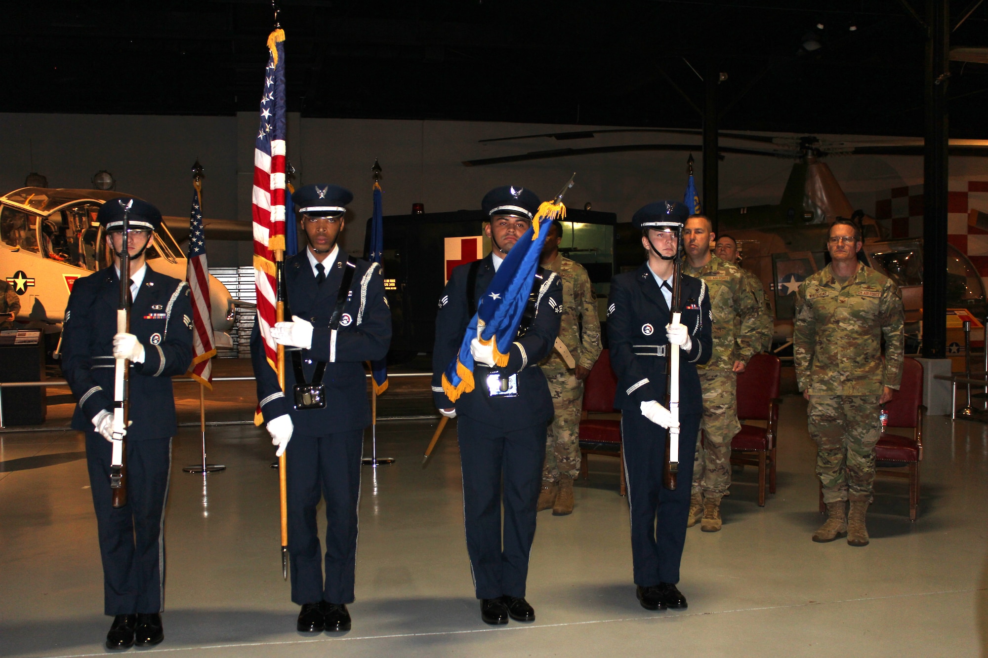 The supporting honor guard present the colors in front of the official party and audience during the 860th Cyberspace Operations Group change of command ceremony at Robins Air Force Base, Georgia on Sept. 14, 2024. (Courtesy photo)