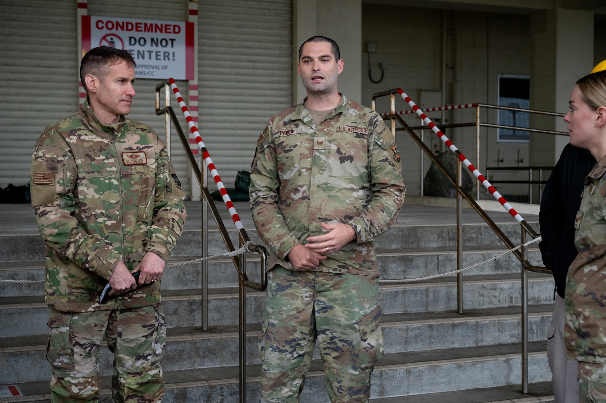 Service member speak amongst each other.