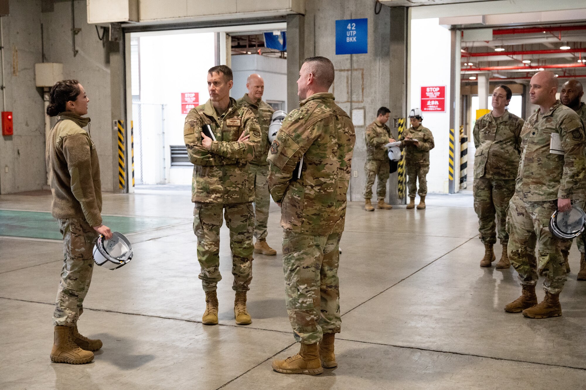 Service member speak amongst each other.