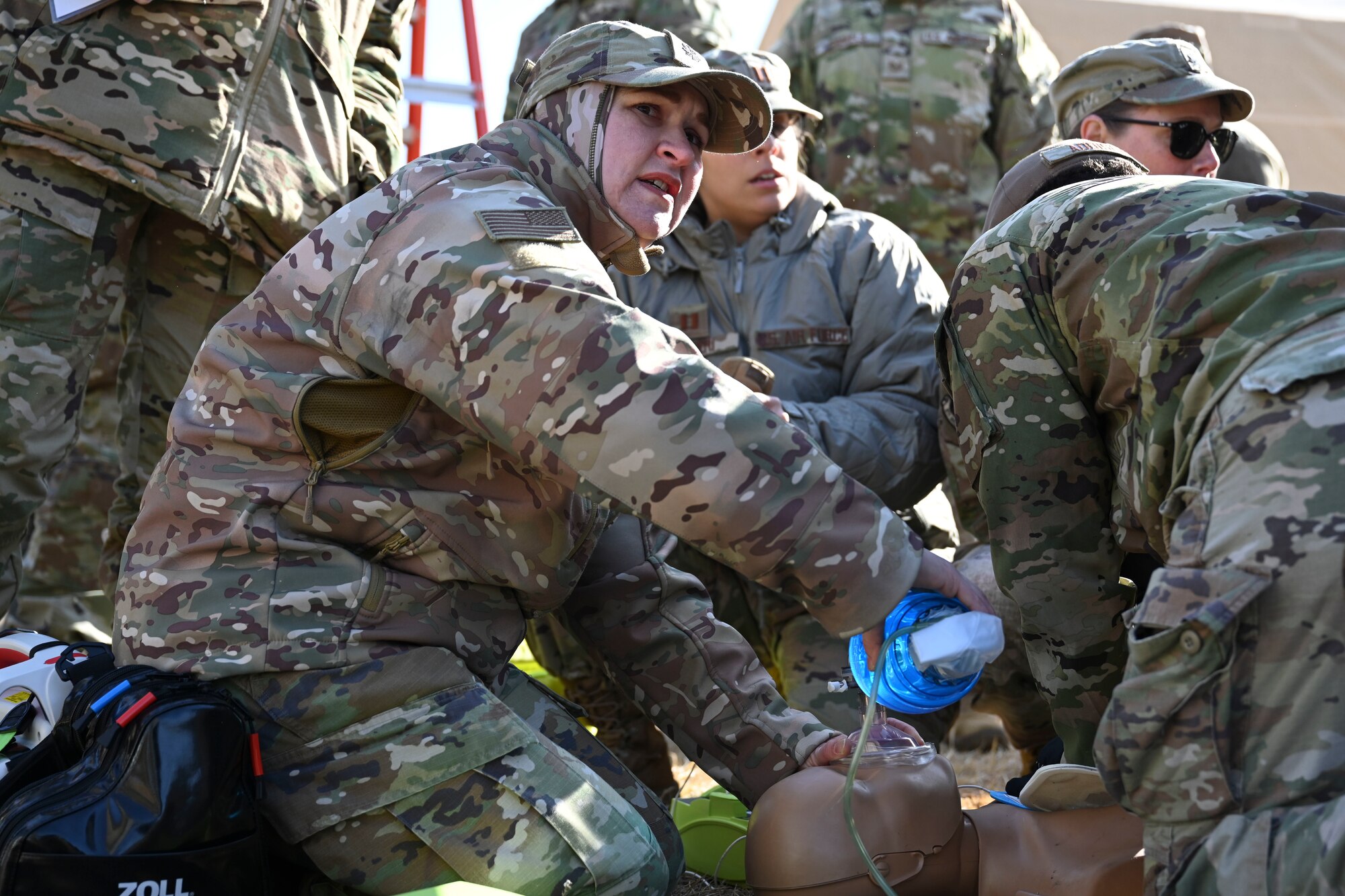 U.S. Air Force Lt. Col. Julie Airhart, 8th Operational Medical Readiness Squadron, Warrior Operational Medicine Flight commander, provides air to a simulated patient during an expeditionary medical support health response team training at Kunsan Air Base, Republic of Korea.