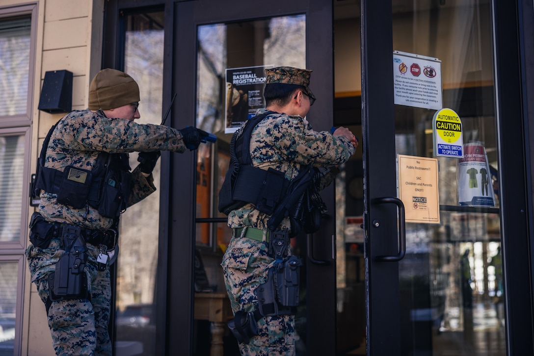 Military police officers with Security Battalion, responds during an active shooter drill on Marine Corps Base Quantico, Virginia, Feb. 14, 2025. These drills are conducted to educate and train the Marines with the Provost Marshall Office and employees of the Child Development Centers on the proper actions to take in the event of an active shooter. (US Marine Corps photo by Lance Cpl. Joaquin Dela Torre)