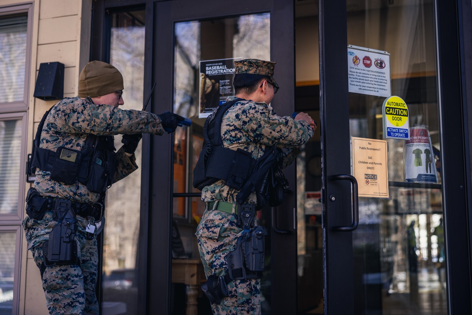 Military police officers with Security Battalion, responds during an active shooter drill on Marine Corps Base Quantico, Virginia, Feb. 14, 2025. These drills are conducted to educate and train the Marines with the Provost Marshall Office and employees of the Child Development Centers on the proper actions to take in the event of an active shooter. (US Marine Corps photo by Lance Cpl. Joaquin Dela Torre)