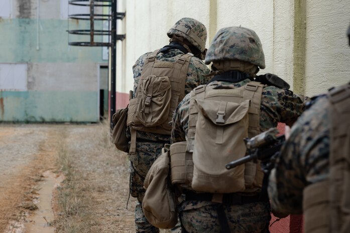 U.S. Marines with III Marine Expeditionary Force Information Group, conduct a patrol as part of close quarters combat training during the Stormbreaker 25.1 exercise on Camp Hansen, Okinawa, Japan, Jan. 29, 2025. The Stormbreaker 25.1 exercise is designed to enhance combat readiness by establishing, maintaining, and defending communication networks and services, enabling commanders to effectively command and control their forces. (U.S. Marine Corps photo by Cpl. Bridgette Rodriguez)