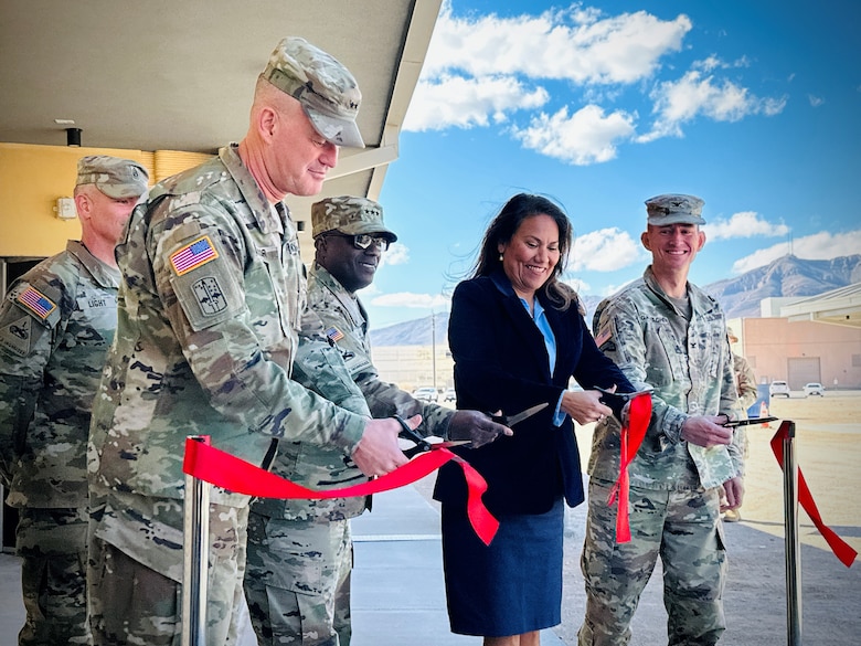 1AD Commanding General Maj. Gen. Curtis Taylor ; Congresswoman Veronica Escobar and Fort Bliss Garrison Commander Col. Brenden Gallagher cut the ribbon for the largest 3D-printed barracks in the DoD.