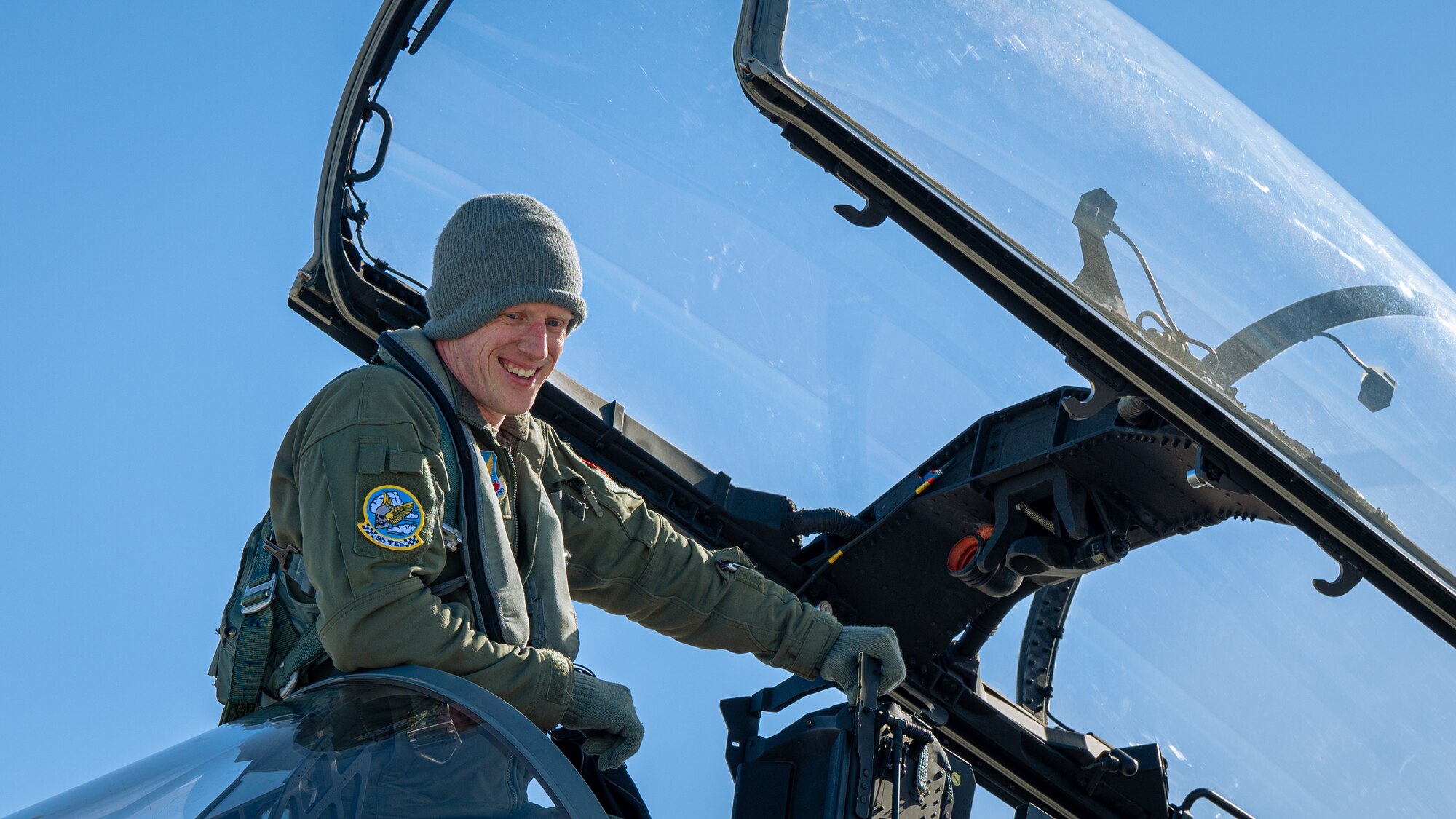 An F-15 EX Eagle ll pilot assigned to the 53rd Wing at Eglin Air Force Base, Fla., prepares to deplane at Grand Forks AFB, N.D., Feb. 19, 2025.