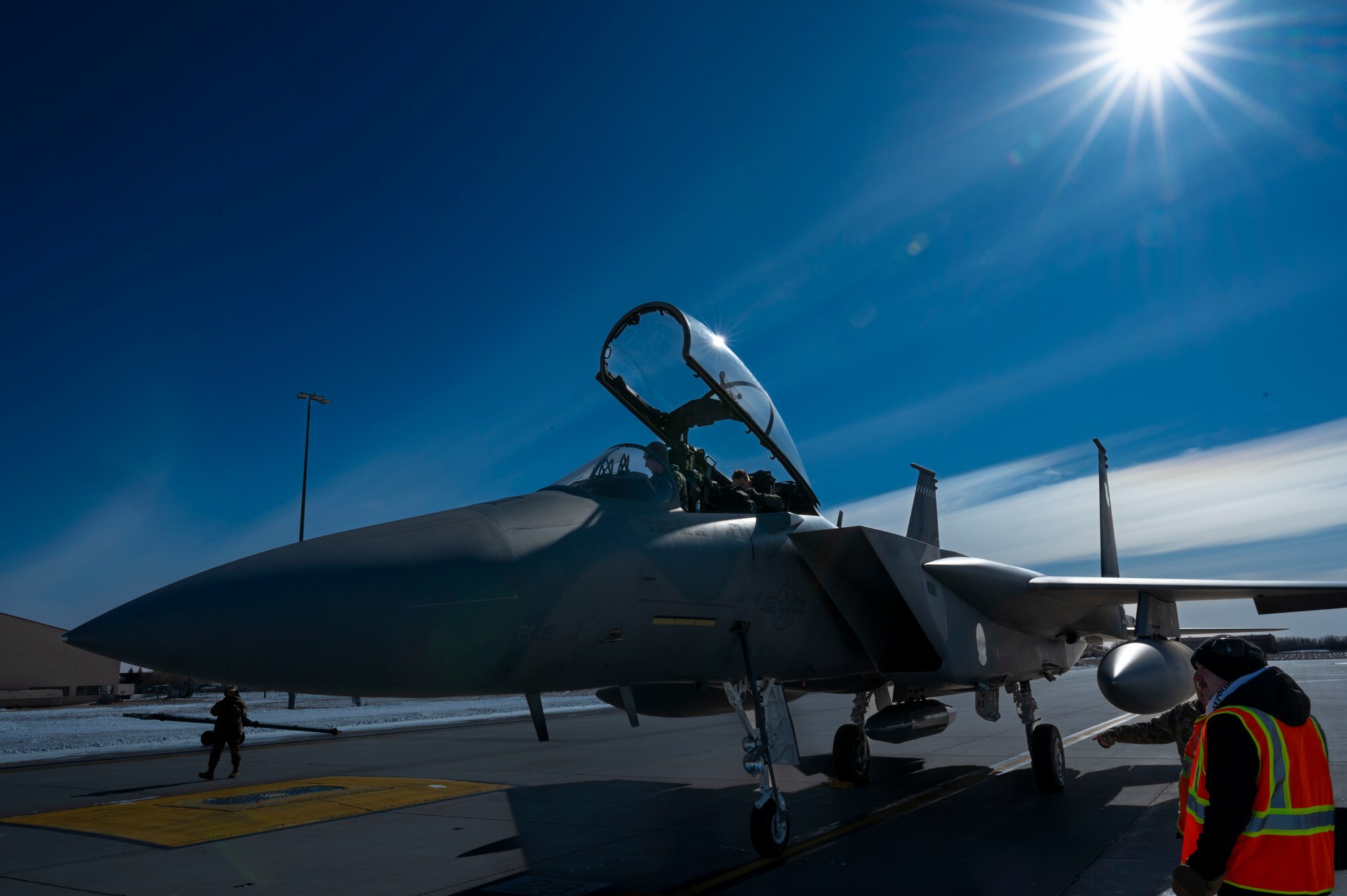 Pilots of an F-15 EX Eagle II assigned to the 53rd Wing at Eglin Air Force Base, Fla., prepare to deplane at Grand Forks AFB, N.D., Feb. 19, 2025.