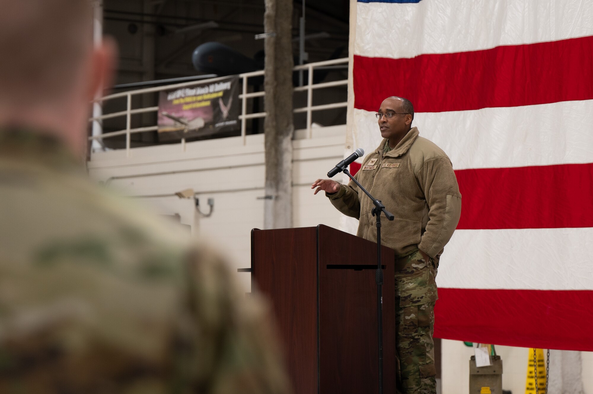 Col. Bishane Whitmore, 319th Reconnaissance Wing deputy commander, gives a speech during a ceremony celebrating Project Streak Eagle and three world and airframe records set at Grand Forks Air Force Base, N.D., Feb. 20, 2024.