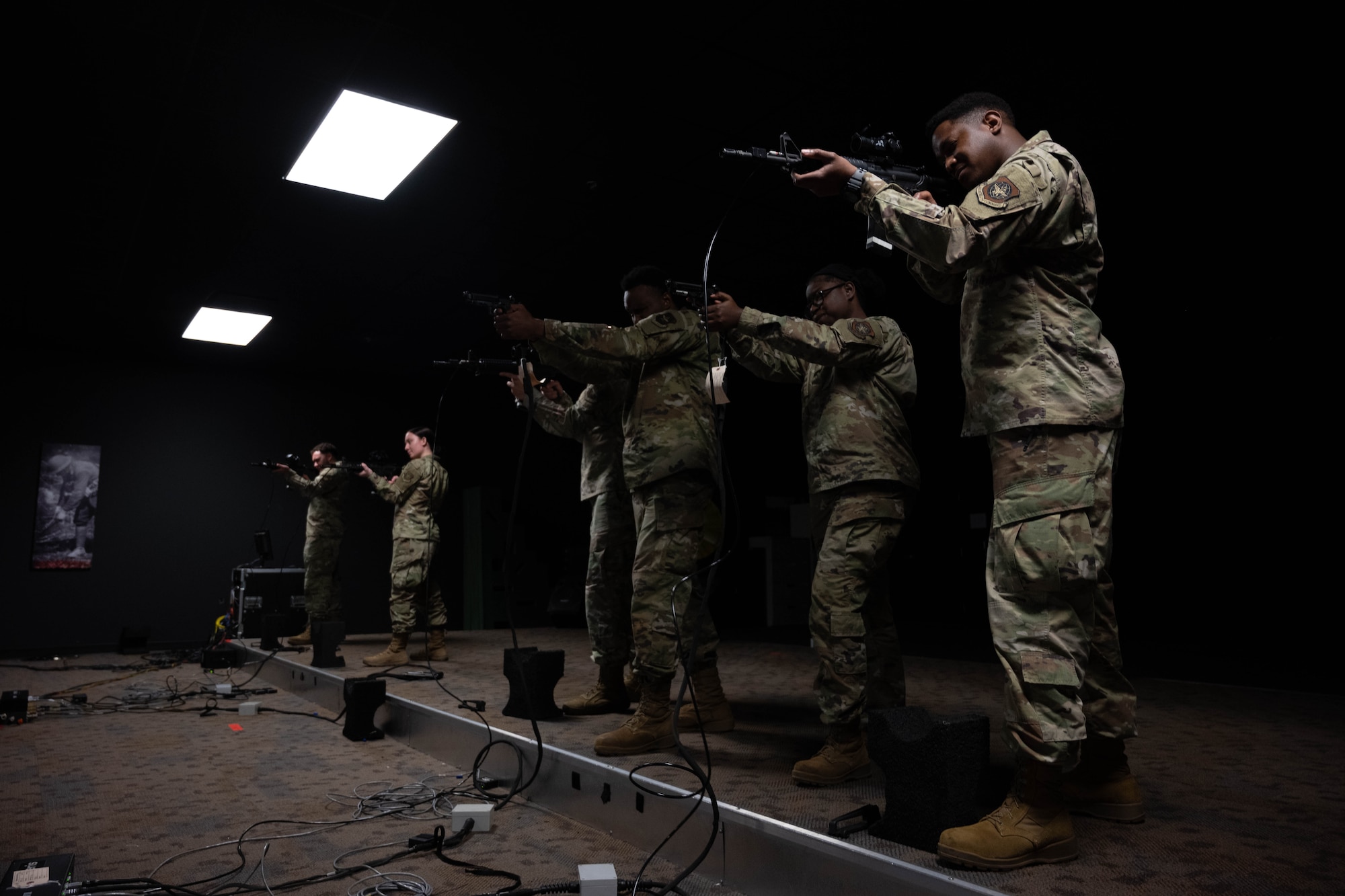 U.S Airmen participate in simulated weapon training.