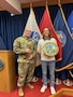 U.S. Army Staff Sergeant, future soldier pose after swear-in ceremony