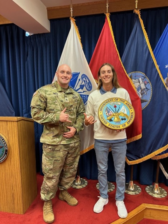 U.S. Army Staff Sergeant, future soldier pose after swear-in ceremony