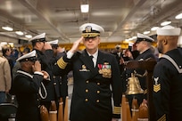 Capt. James Von St. Paul is piped ashore during a change of command ceremony aboard the world's largest aircraft carrier USS Gerald R. Ford (CVN 78), February 22, 2025.
