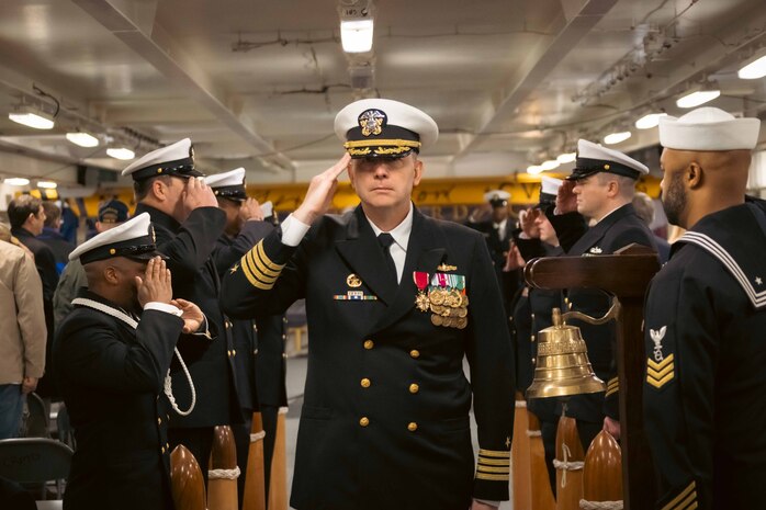 Capt. James Von St. Paul is piped ashore during a change of command ceremony aboard the world's largest aircraft carrier USS Gerald R. Ford (CVN 78), February 22, 2025.