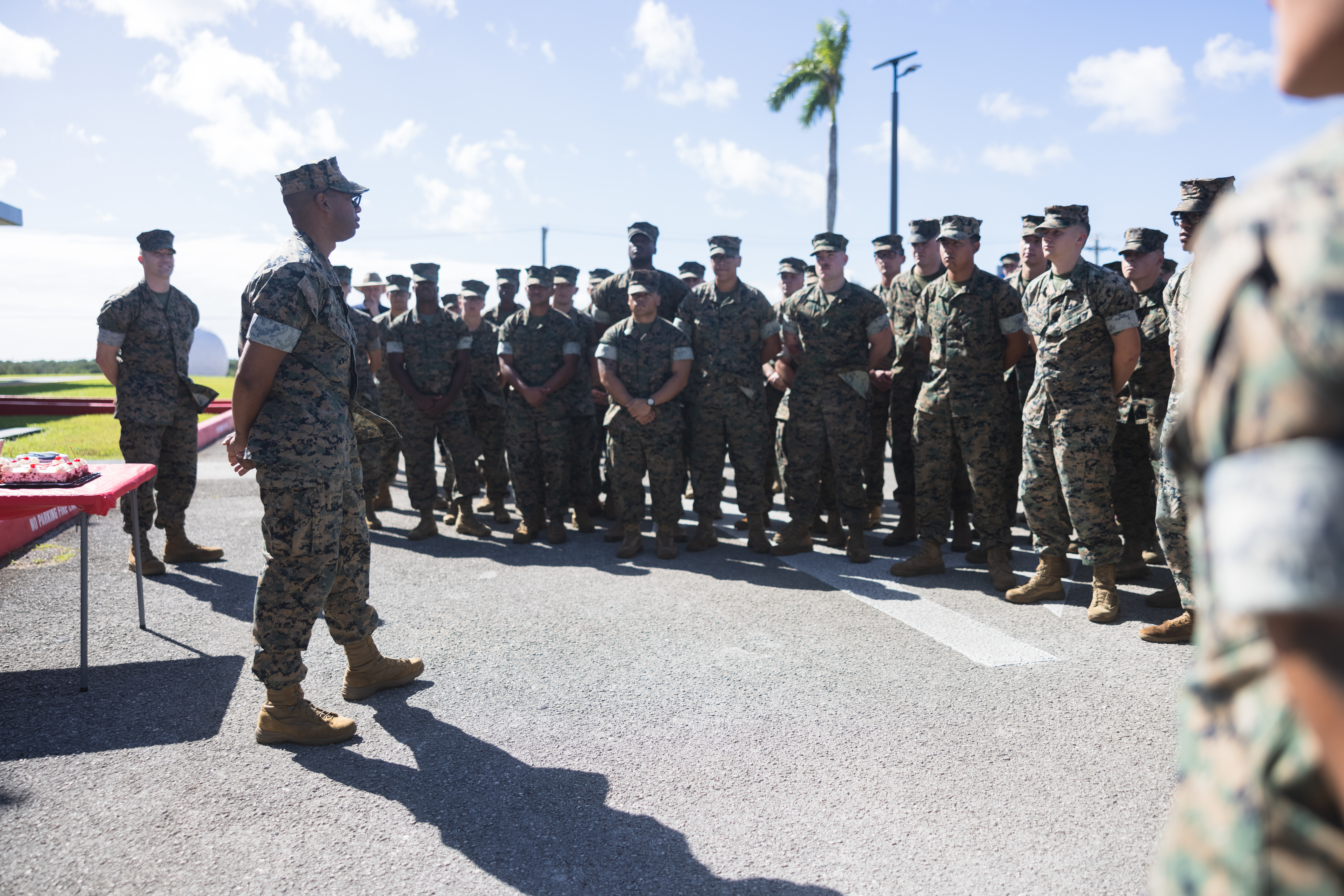 U.S. Marine Corps Staff Sgt. Marcellous Dixon, training chief, Headquarters Company, Marine Corps Base Camp Blaz, addresses the Marines and Sailors during a formation at MCB Camp Blaz, Guam, Feb. 14, 2025. During the formation, Dixon was recognized for winning the Marine Corps Installations Command Marine of the Year Award. (U.S. Marine Corps photo by Cpl. Brayden Daniel)