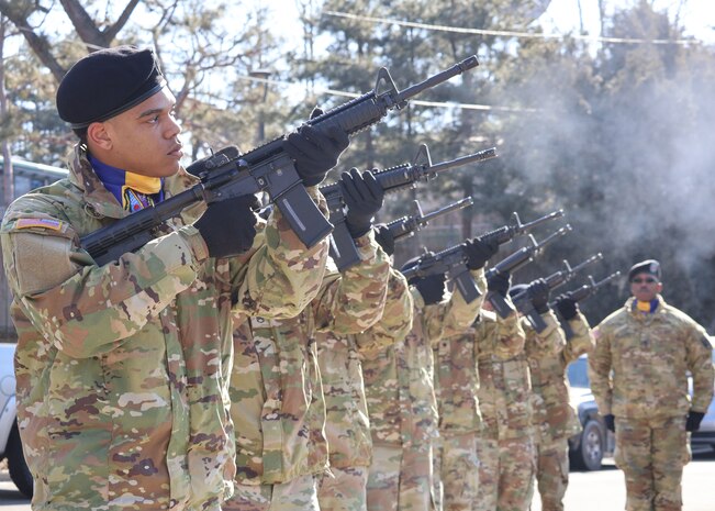 A U.S. Army honor guard detail fires their rifles during the 74th anniversary of the Battle of Bayonet Hill Commemoration Ceremony held at Osan Air Base, South Korea, Feb. 20, 2025.