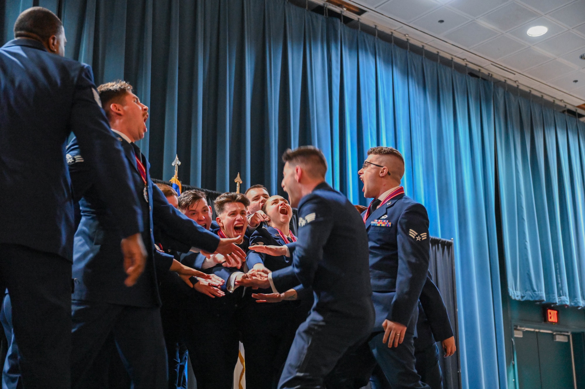 Airman Leadership School graduates from Class 25A, Hercules Flight celebrate winning the Etchberger Team award at William A. Egan Civic and Convention Center, Anchorage, Alaska, Feb. 12.