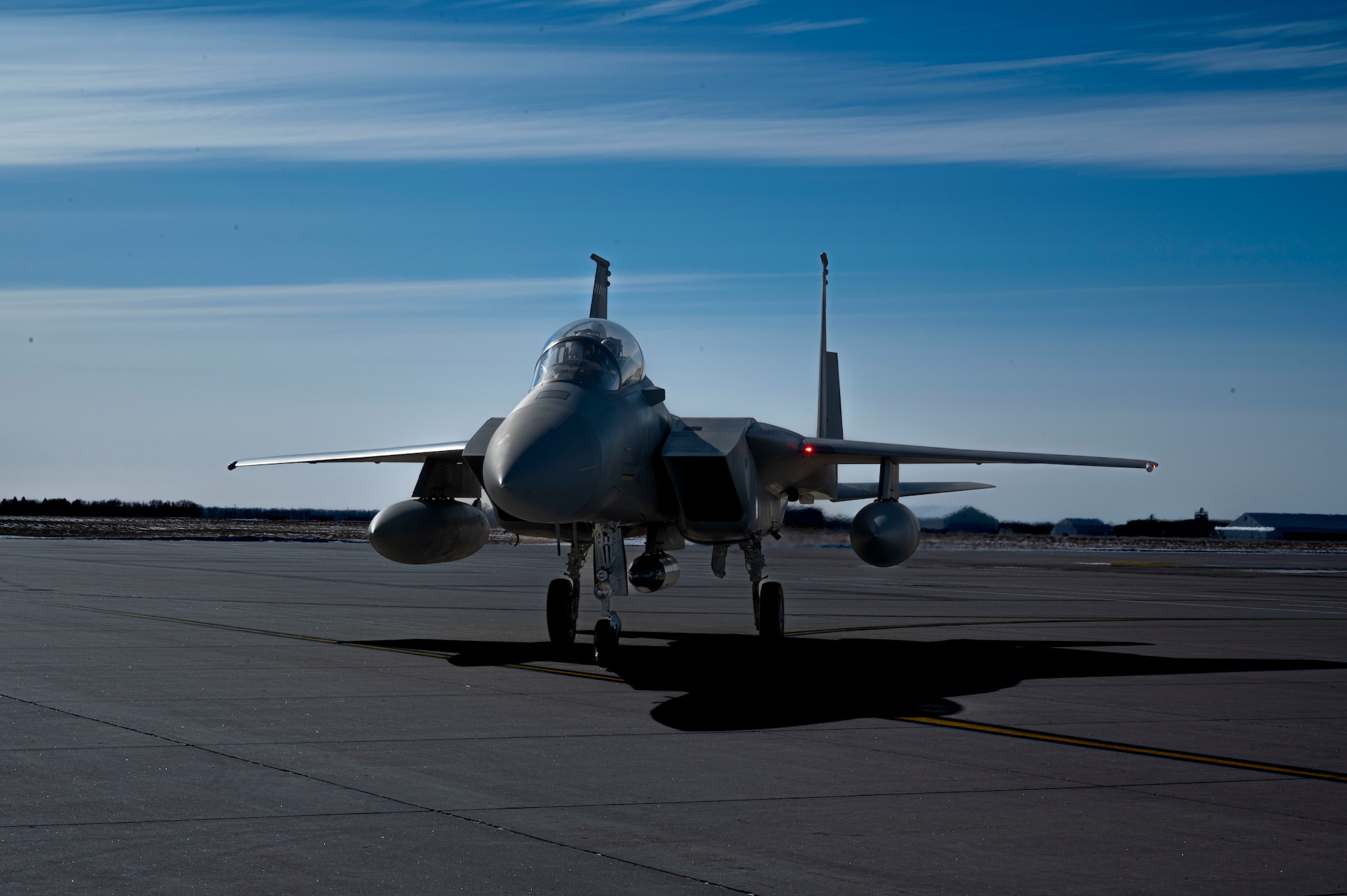 An F-15 EX Eagle II assigned to the 53rd Wing at Eglin Air Force Base, Fla., taxis to park at Grand Forks AFB, N.D., Feb. 19, 2025.