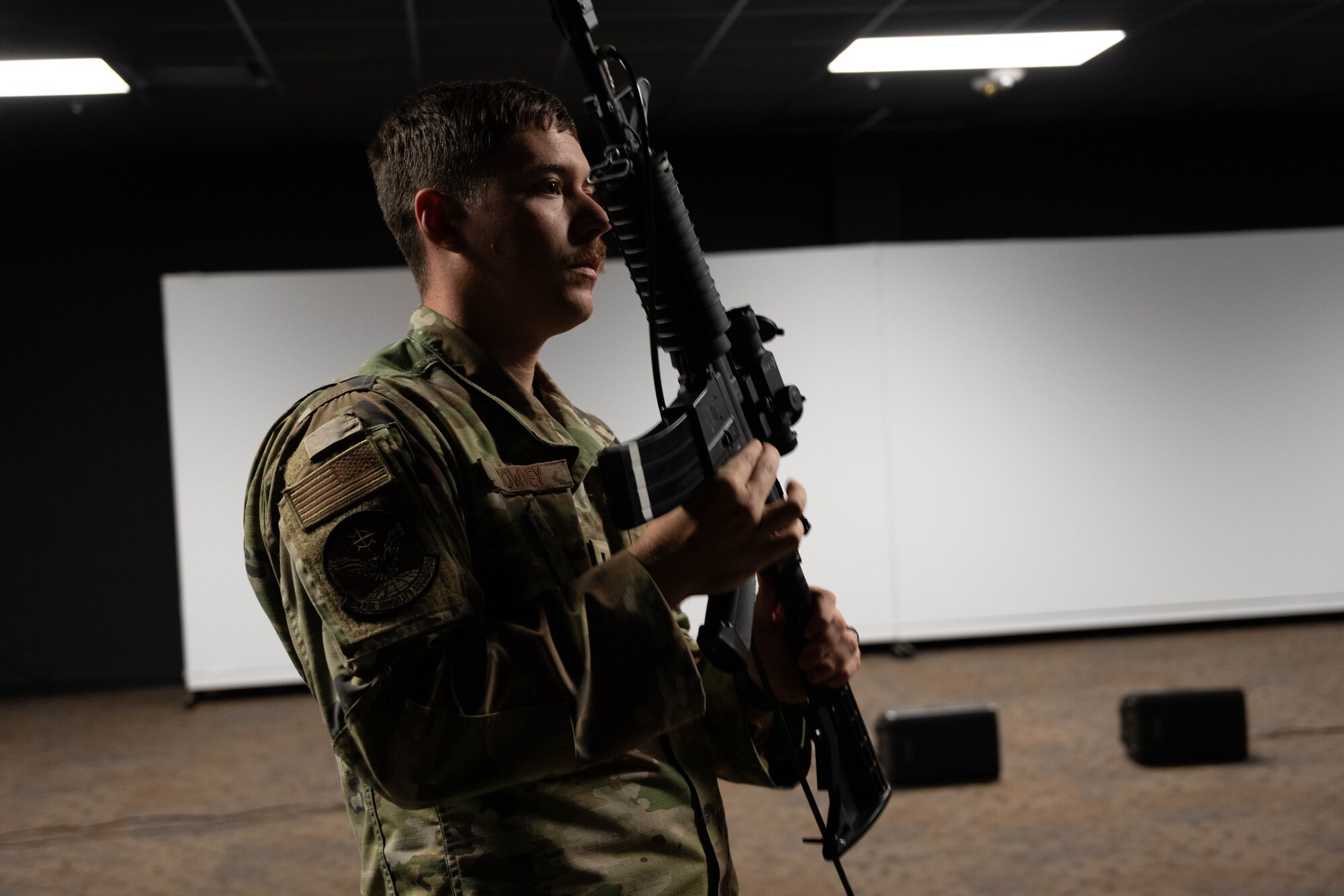 A U.S Airman shows weapon safety for a M4 Carbine.