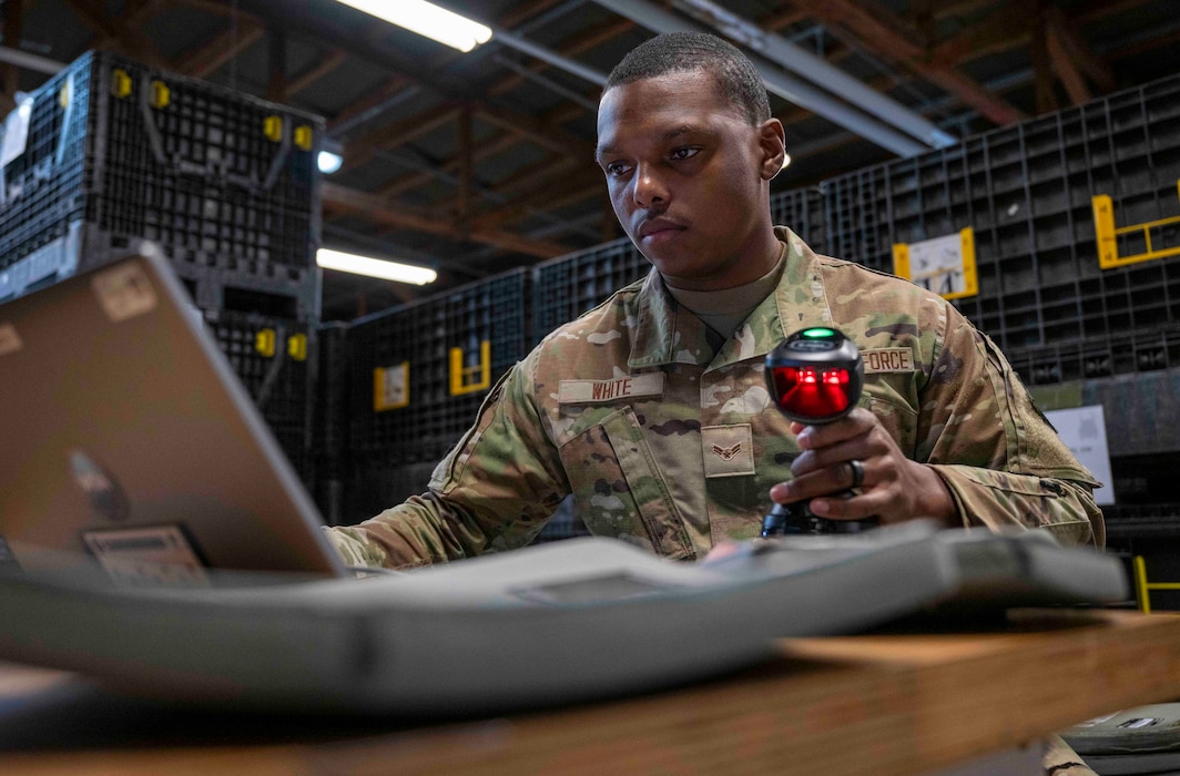 U.S. Air Force Airman 1st Class Deshawn White, 52nd Logistics Readiness Squadron material management, scans individual plates into a Radio Frequency Identification (RFID) system at Spangdahlem Air Base, Germany, Feb. 7, 2025.