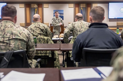 Capt. JD Crinklaw, commander, Puget Sound Naval Shipyard & Intermediate Maintenance Facility, welcomes a group of approximately 90 SurgeMain Sailors Feb. 2, during a briefing at Olympic Lodge at Naval Base Kitsap-Bremerton, Washington, in preparation for the Reservists' annual two-week training deployment at PSNS & IMF. (U.S. Navy photo by Wendy Hallmark)