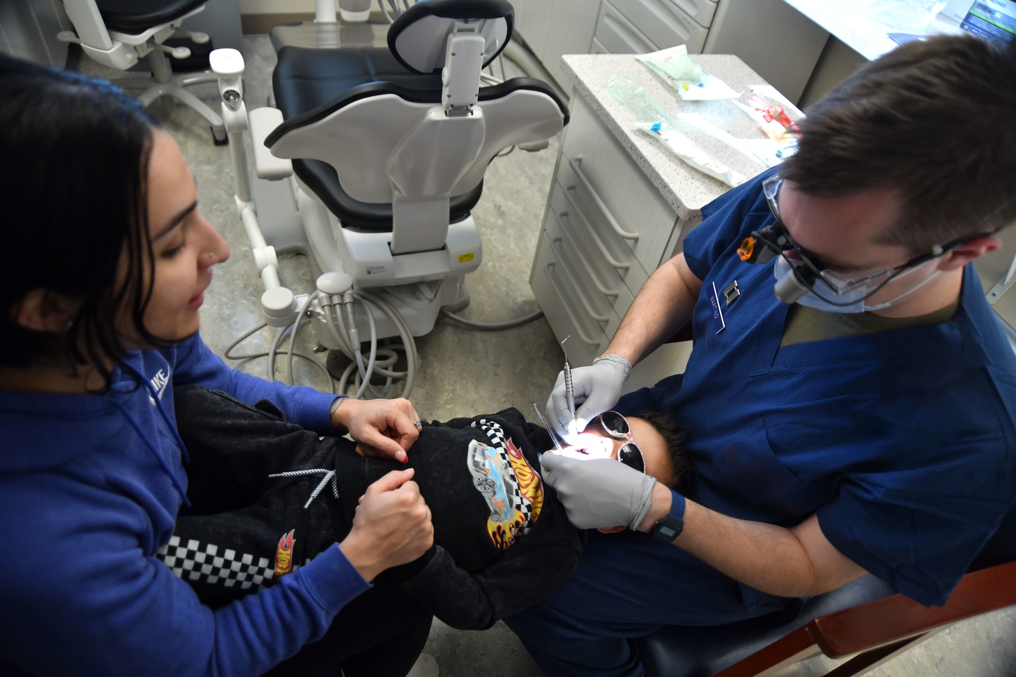 woman, child and dentist