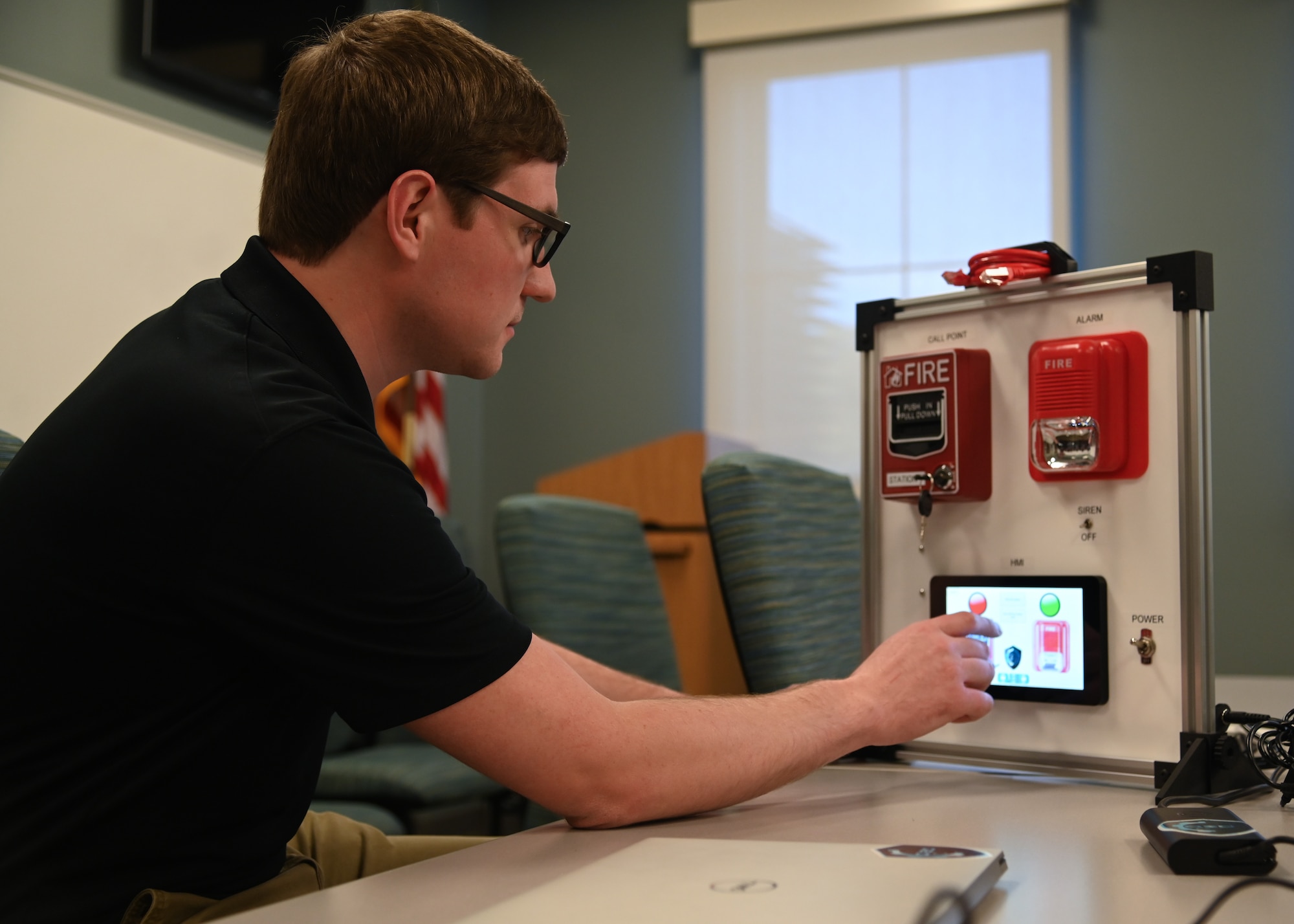 military students use classroom simulators to practice cybersecurity attacks and defenses in a classroom