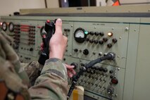 U.S. Air Force Staff Sgt. Shawn Powers, 9th Maintenance Air Force Repair Enhancement Program (AFREP) technician, tests a T-38 Talon stick grip for functionality at Beale Air Force Base, California, Jan. 27, 2025.