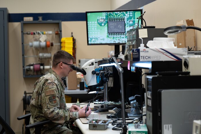 U.S. Air Force Staff Sgt. Shawn Powers, 9th Maintenance Air Force Repair Enhancement Program (AFREP) technician, repairs a multilayer circuit card at Beale Air Force Base, California, Feb. 4, 2025.