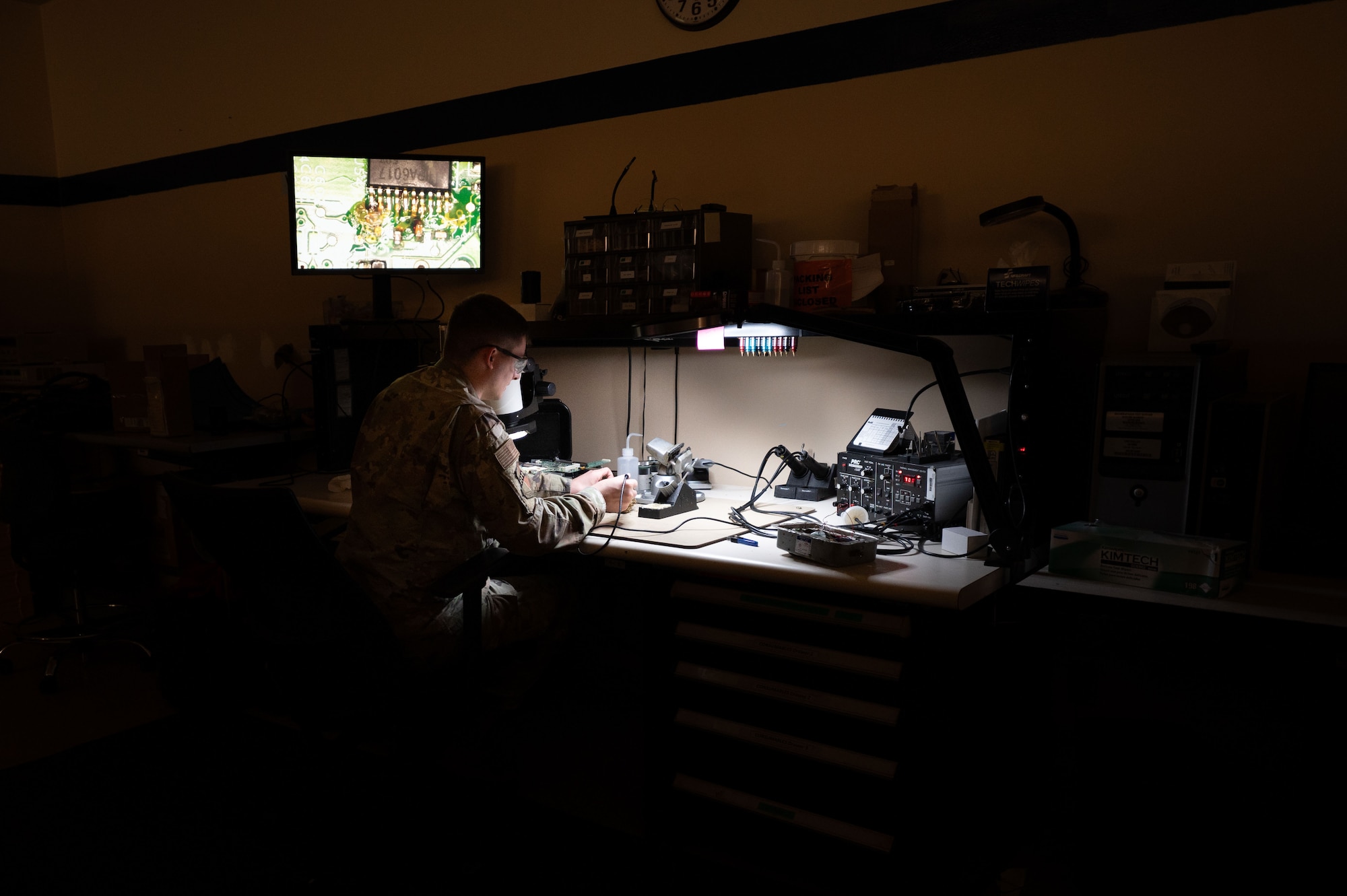 U.S. Air Force Staff Sgt. Shawn Powers, 9th Maintenance Air Force Repair Enhancement Program (AFREP) technician, repairs a multilayer circuit card at Beale Air Force Base, California, Feb. 4, 2025.