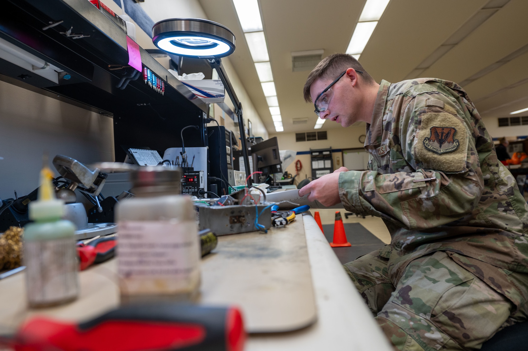 U.S. Air Force Staff Sgt. Shawn Powers, 9th Maintenance Air Force Repair Enhancement Program (AFREP) technician, repairs a T-38 Talon navigation light at Beale Air Force Base, California, Feb. 4, 2025.