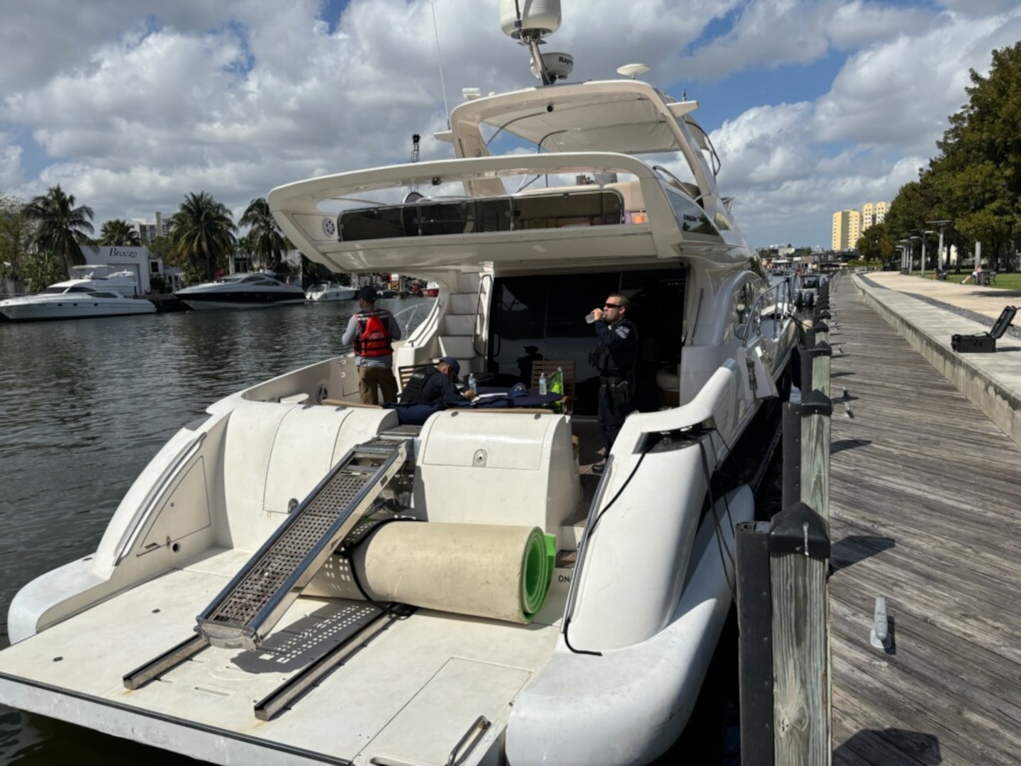 Coast Guard Sector Miami law enforcement officers, along with federal and state law enforcement partners, board the 70-foot motor yacht Indigo in Miami, Feb. 22, 2025. The owner of Indigo was reportedly operating as an illegal charter, with 11 passengers for hire on the vessel, violating a previously issued Captain of the Port Order from May 2023 for operating as a bareboat charter without a choice of crew. (U.S. Coast Guard photo)