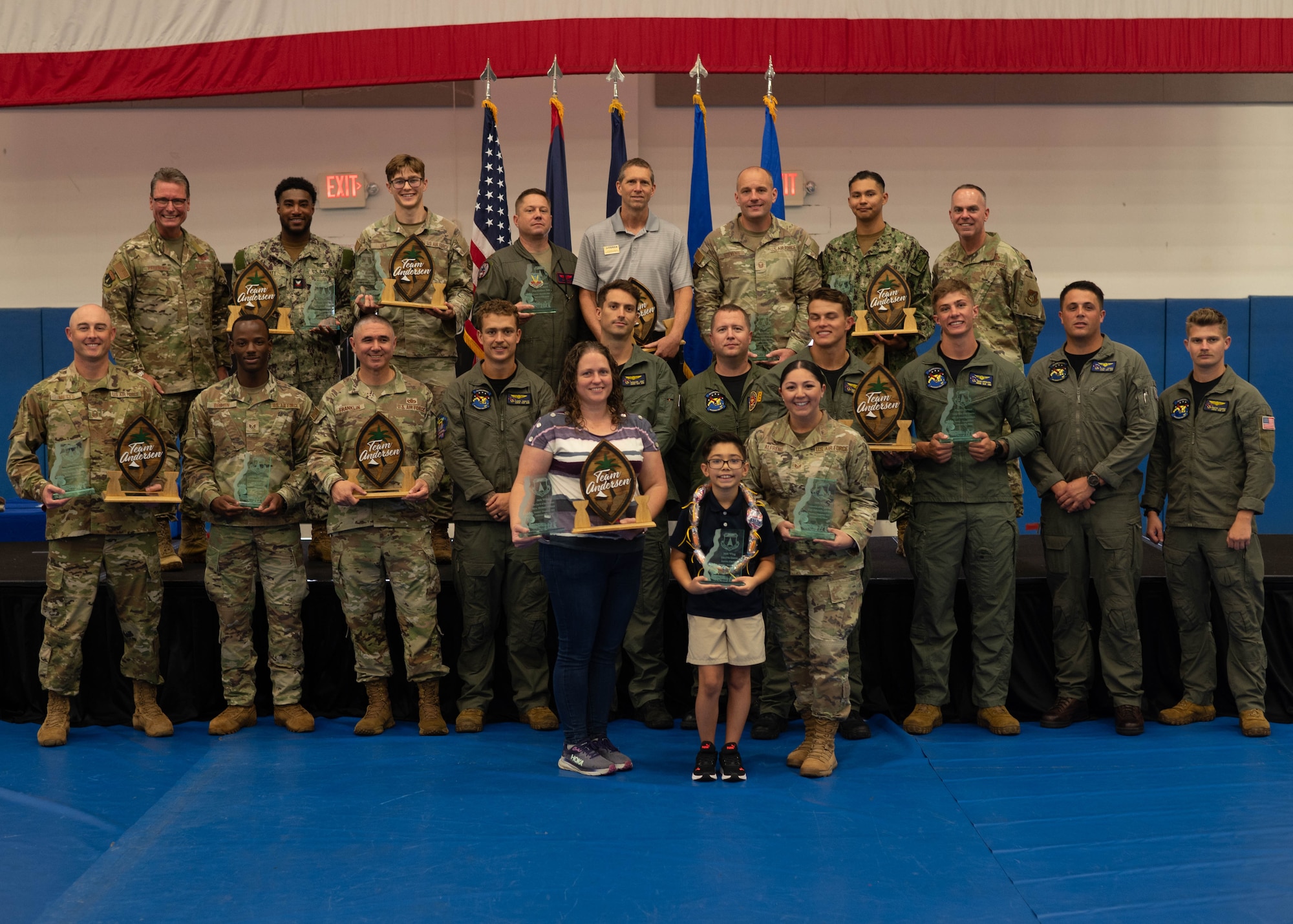 Winners of Team Andersen's 4th Quarter Wing Awards pose for a group photo in the Coral Reef Fitness Center at Andersen Air Force Base, Guam, Feb. 13, 2025. This event celebrates the hard work and dedication these winners have put into their work in the last few months. (Airman 1st Class Joseph Maye)