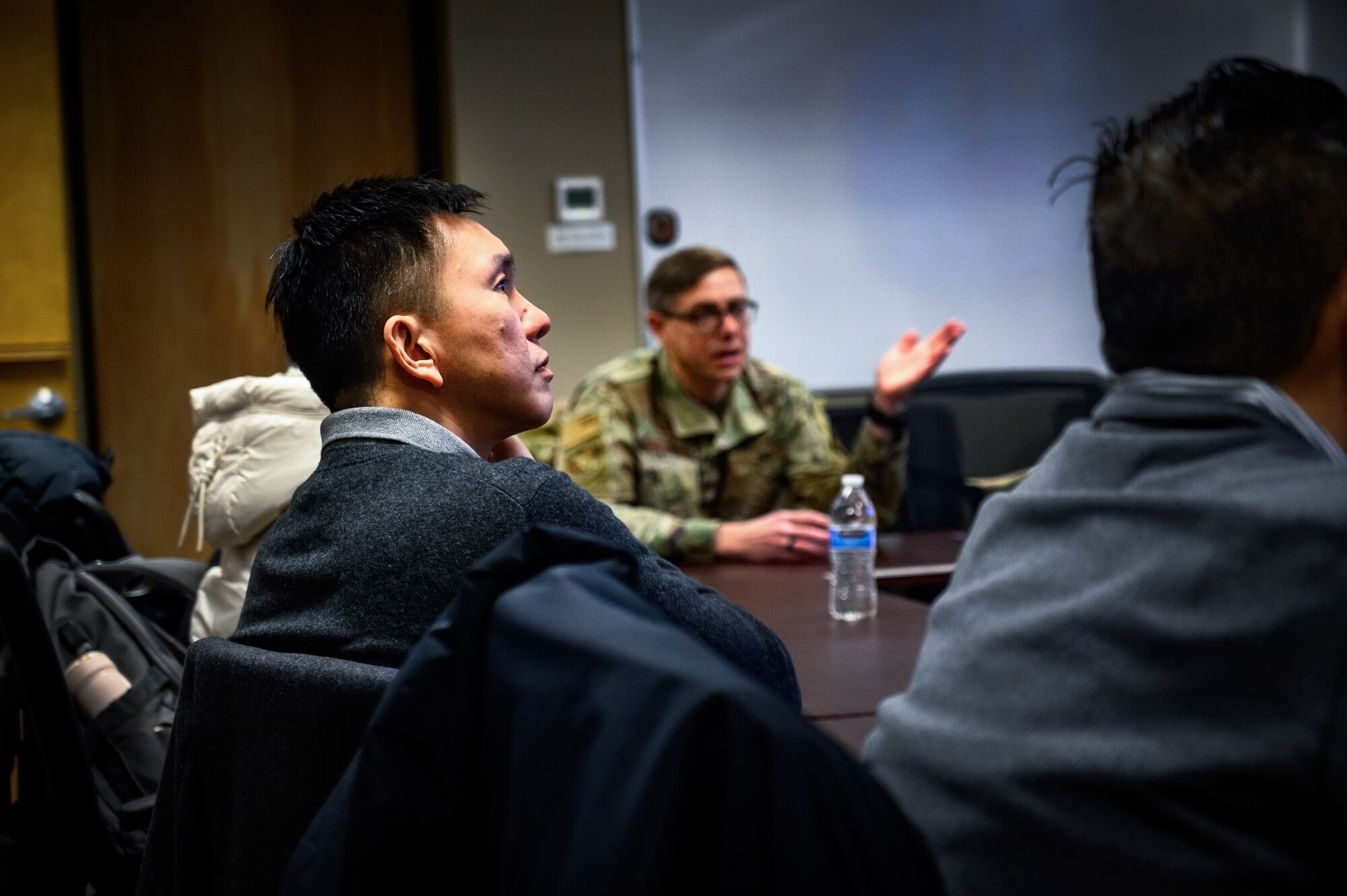 U.S. Air Force Col. Michael Stefanovic (right), 87th Civil Engineer Group commander, briefs Maj. Gen. Kelvin Fan (left), Republic of Singapore Air Force chief of staff, at Joint Base McGuire-Dix-Lakehurst, N.J., Feb. 20, 2025. The RSAF visit showcased JB MDL’s power sources such as backup generators, batteries, and a photovoltaic power station intended to improve grid resiliency and better support day-to-day operations among its 89 mission partners. (U.S. Air Force photo by Senior Airman Matt Porter)