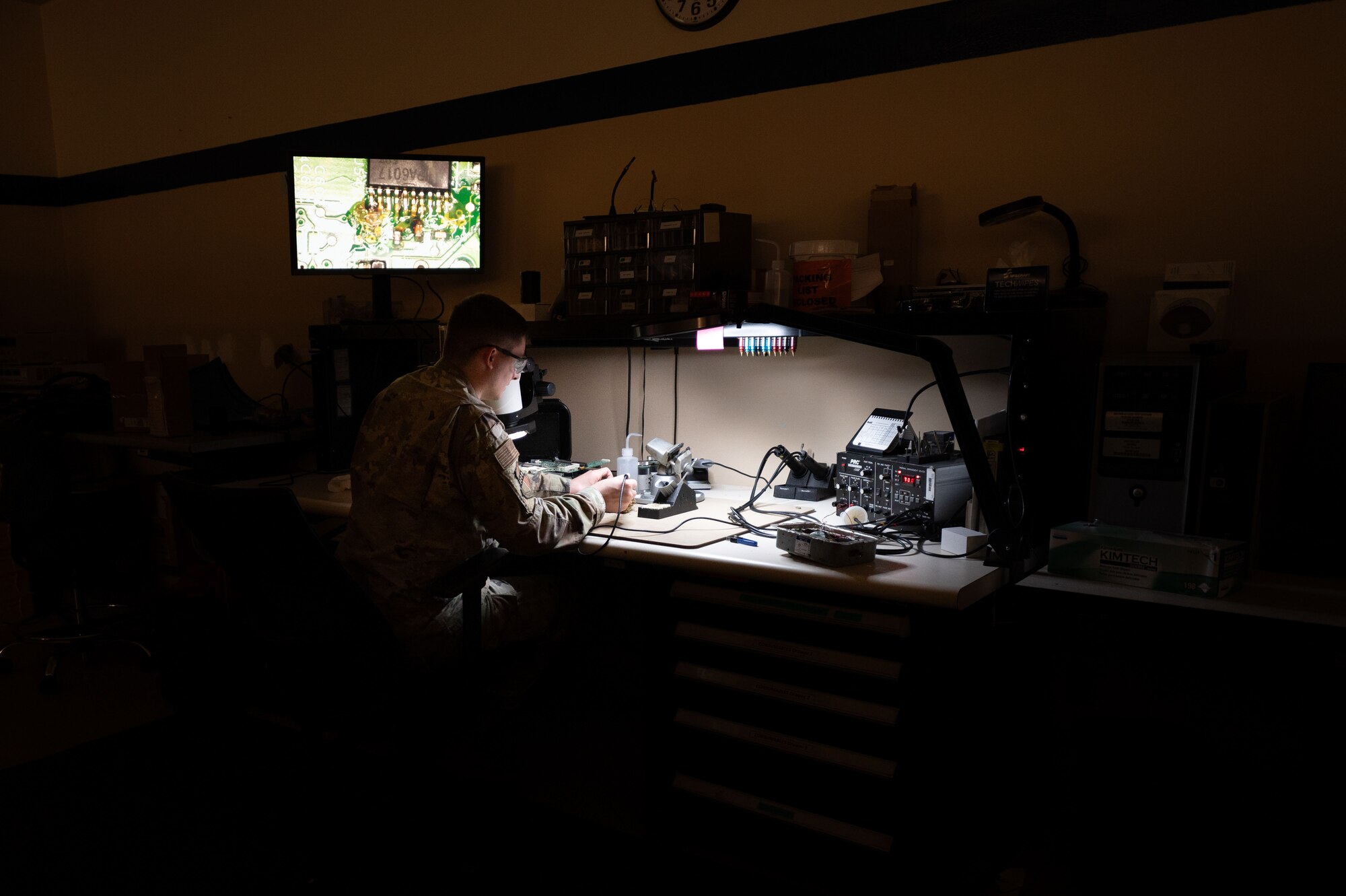 U.S. Air Force Staff Sgt. Shawn Powers, 9th Maintenance Air Force Repair Enhancement Program (AFREP) technician, repairs a multilayer circuit card at Beale Air Force Base, California, Feb. 4, 2025.