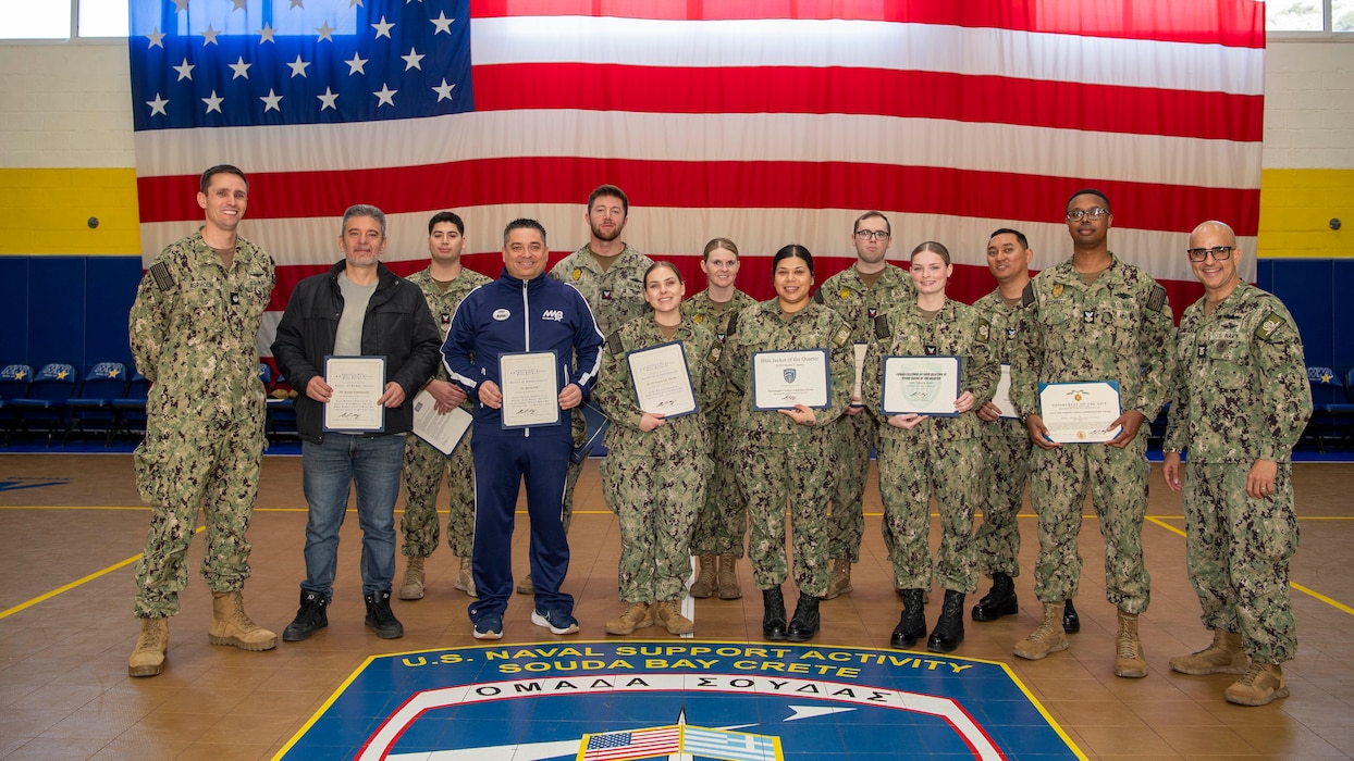 Personnel assigned to Naval Support Activity Souda Bay, receive awards and recognitions, from Cmdr. Steven Aspholm, executive officer, NSA Souda Bay during an awards ceremony on Feb. 18, 2025, onboard NSA Souda Bay, Crete, Greece.