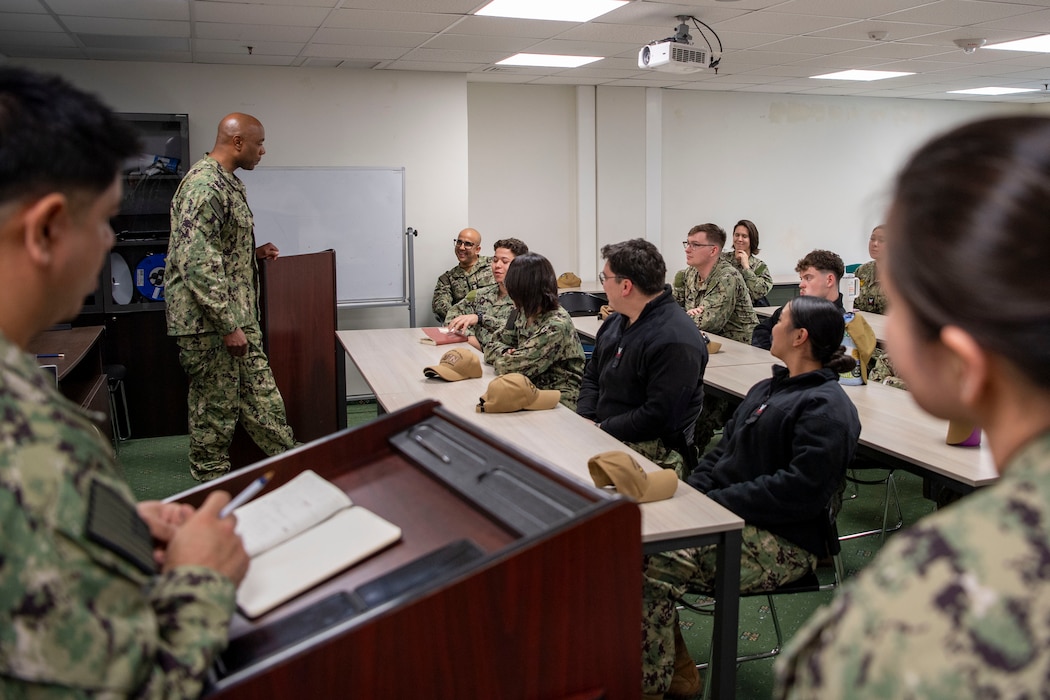 Naval Forces Europe- Africa Fleet Master Chief Lateef Compton speaks to the junior Sailors onboard Naval Support Activity Souda Bay, Crete, Greece, during a visit to the installation on Feb. 19, 2025.