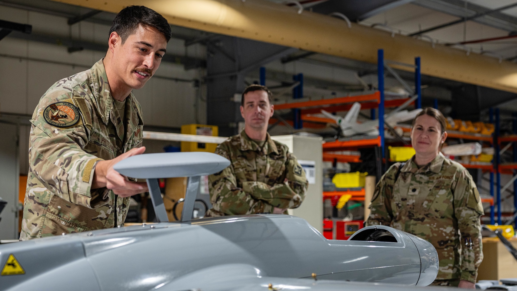 Airman talks to group.