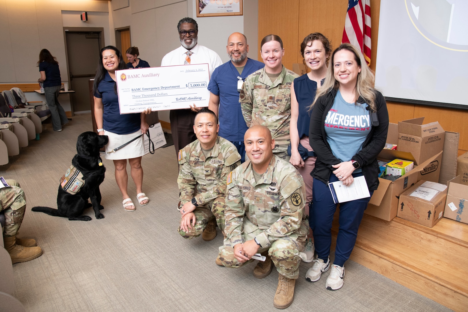 The BAMC Auxiliary presents a grant check to members of Brooke Army Medical Center’s Emergency Department in BAMC’s Carolyn D. Putnam Auditorium, Joint Base San Antonio – Fort Sam Houston, Texas, Feb. 5, 2025. Since 2019, the BAMC Auxiliary has given more than $170,000 worth of items to departments throughout BAMC. (DoD photo by Jason W. Edwards)