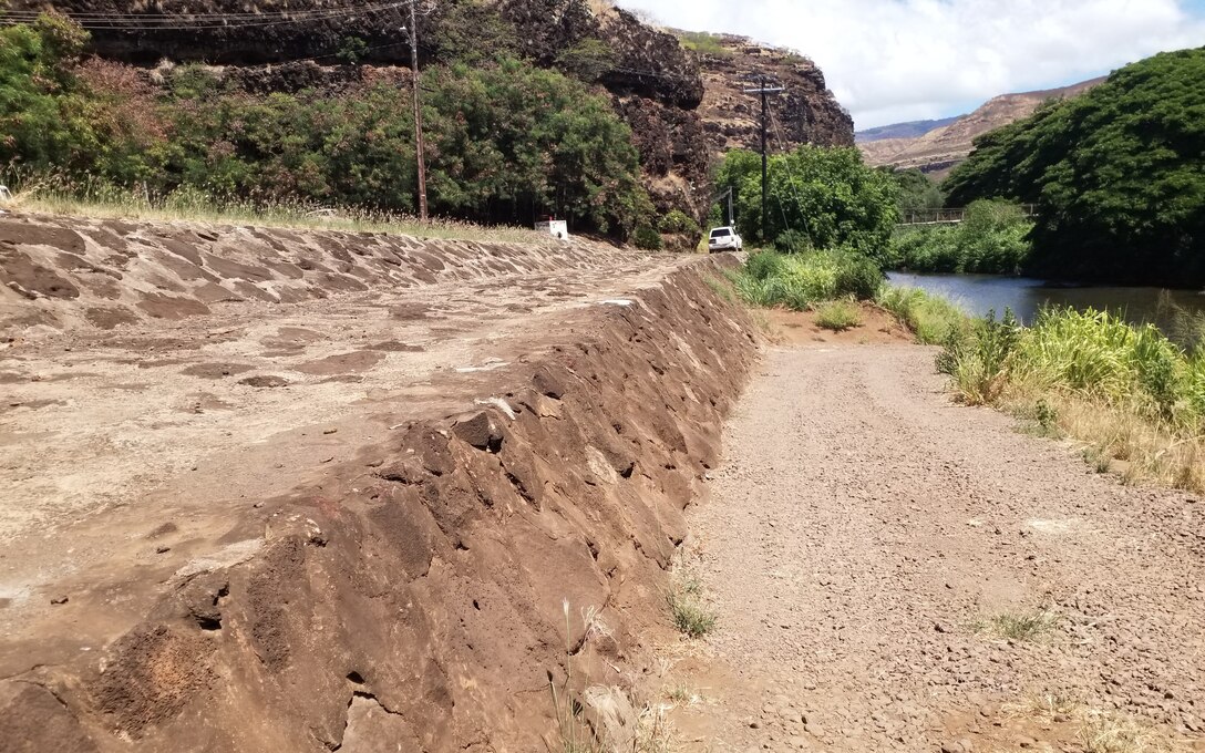 A "sediment island" formed in the Waimea River FCP channel of natural causes. Photo of downstream extent of sediment island taken from atop Waimea River FCP levee, right bank at Menehune Road and facing upstream. (USACE, 2024)
