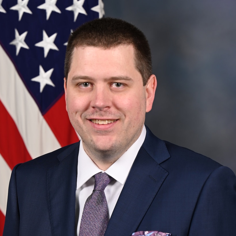 Mr. Jonathan Elliot poses for his official portrait in the Army portrait studio at the Pentagon in Arlington, Va., Feb. 16, 2024.  (U.S. Army photo by Spc. Stephanie Backus)