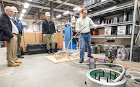 Rear Adm. Peter Small, chief engineer and deputy commander, Naval Sea Systems Engineering & Logistics, toured facilities at Puget Sound Naval Shipyard & Intermediate Maintenance Facility in Bremerton, Washington, Feb. 4, 2025, to learn about the command's technological advancements and infrastructure challenges. (U.S. Navy photo by Wendy Hallmark)