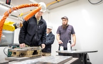 Rear Adm. Peter Small, chief engineer & deputy commander, Naval Sea Systems Engineering & Logistics tours Shop 31, at Puget Sound Naval Shipyard & Intermediate Maintenance Facility in Bremerton, Washington Feb. 4, 2025. (U.S. Navy photo by Wendy Hallmark)