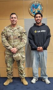 SSG Salas poses with his son after swear in