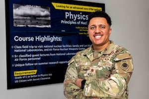 Maj. Kaz “Dexter” Moffett, U.S. Air Force Academy Physics instructor, poses for a photo at the Academy, Colo., Feb. 12, 2025. Moffett, a 2014 Academy graduate, served as a missileer and weapons officer where he gained extensive operational experience with the Minuteman III intercontinental ballistic missile system before returning to the Academy as an instructor. (U.S. Air Force photo by Trevor Cokley)