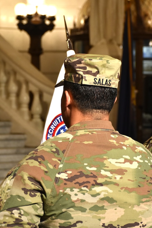 SSG Salas holds company flag colors during company guideon during a change of responsibility