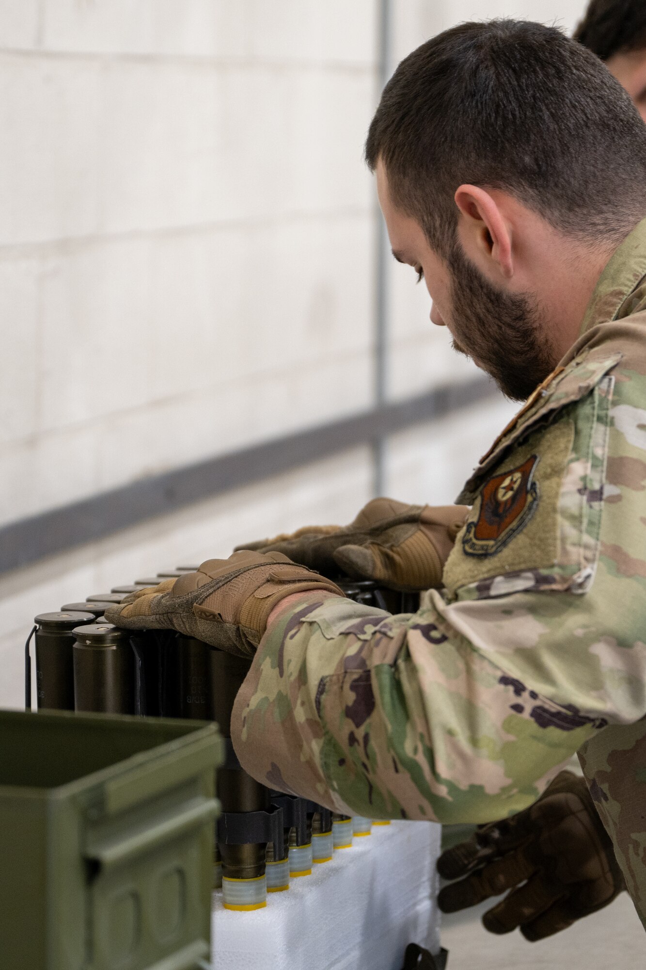 A U.S. Air Force munitions specialist assigned to the 1st Special Operations Wing unloads munitions containers at Hurlburt Field, Florida, Jan. 15, 2025.