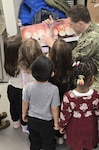 Dentists from Walter Reed paid visits to military Child Development Centers throughout the Defense Health Network-National Capital Region, including Walter Reed's, during February to stress the importance of good oral hygiene.
