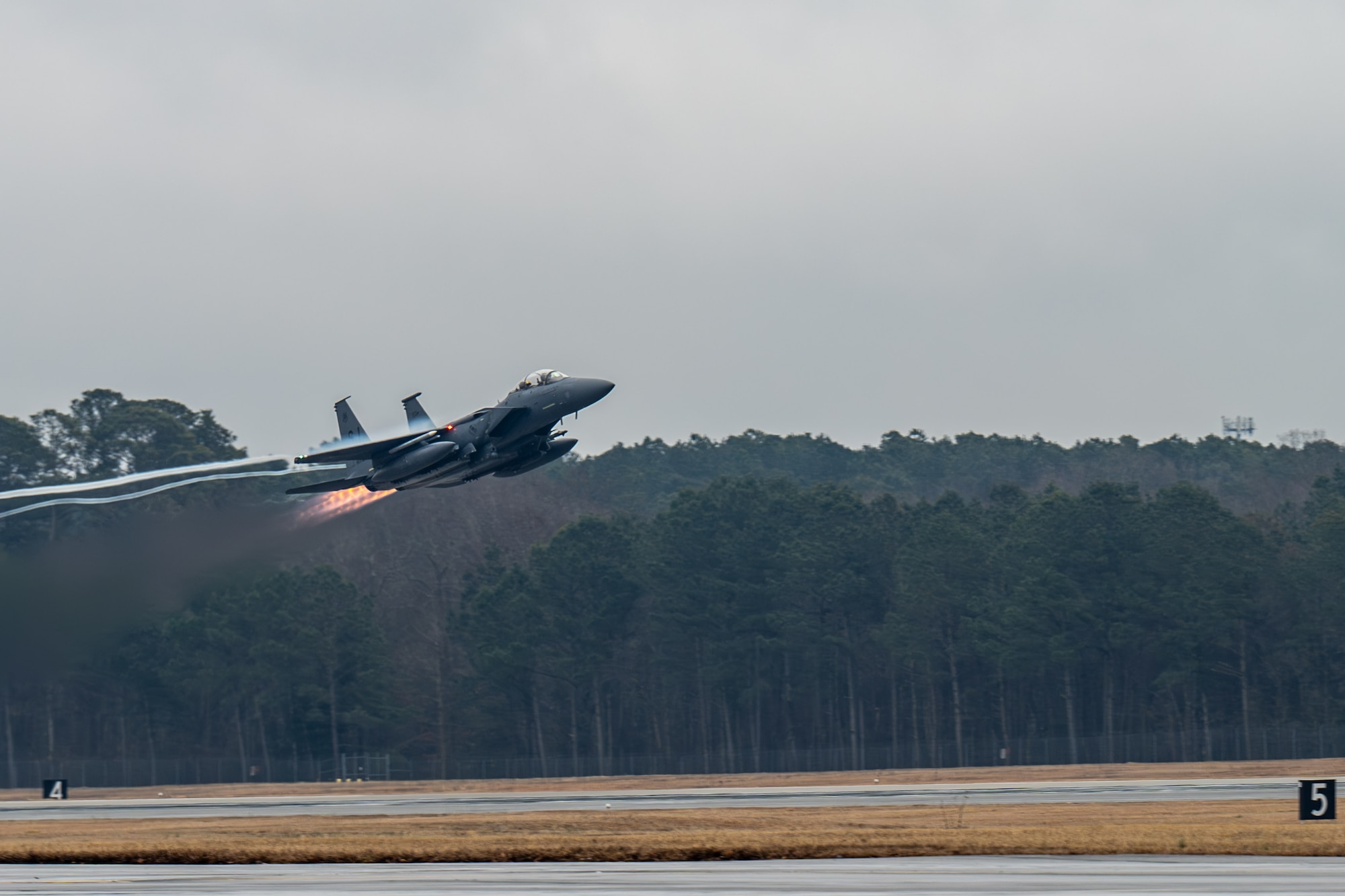 An F-15E Strike Eagle assigned to the 334th Fighter Squadron takes off from the flightline, Jan. 27, 2025, at Seymour Johnson Air Force Base, North Carolina. The Strike Eagle is a dual-role fighter jet designed to perform air-to-air and air-to-ground missions. (U.S. Air Force photo by Airman 1st Class Rebecca Tierney)